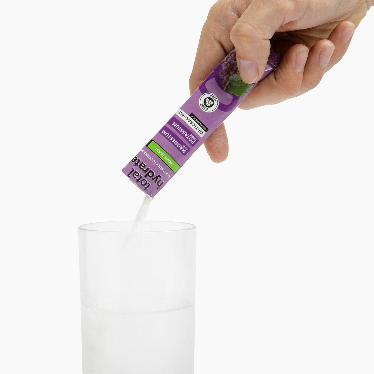 Iron Age Nutrition Total Hydrate electrolyte powder in Grape Blast flavor, showing the vibrant purple powder in a container.