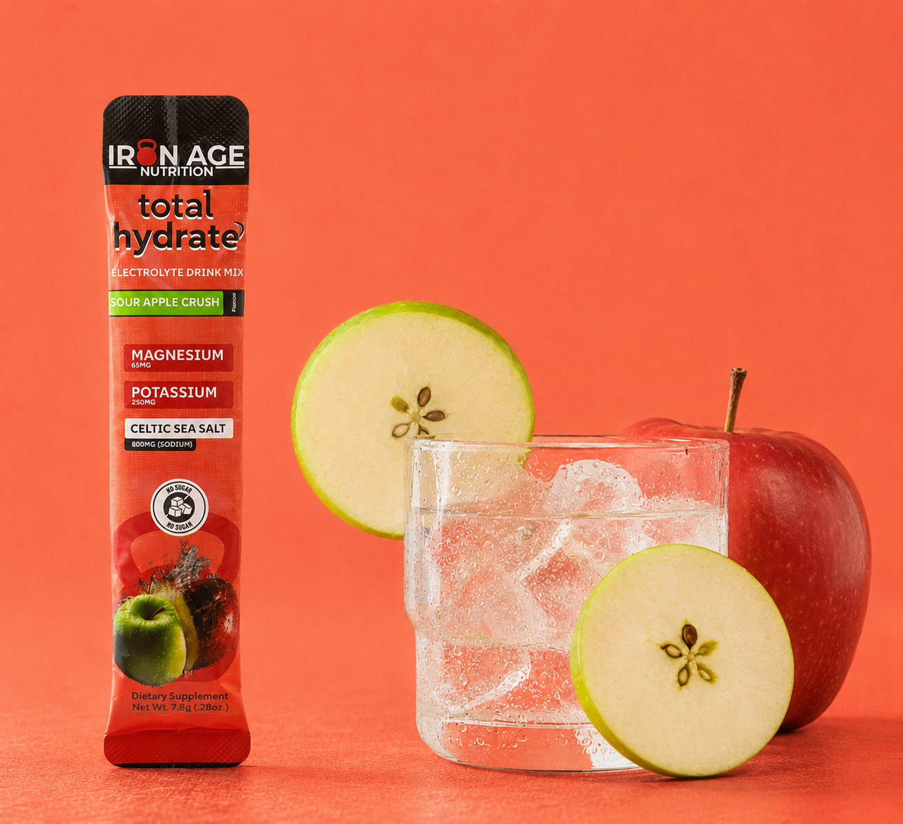 Total Hydrate™ Electrolyte Powder by Iron Age Nutrition in Sour Apple Crush flavor, showing the colorful powder packet.