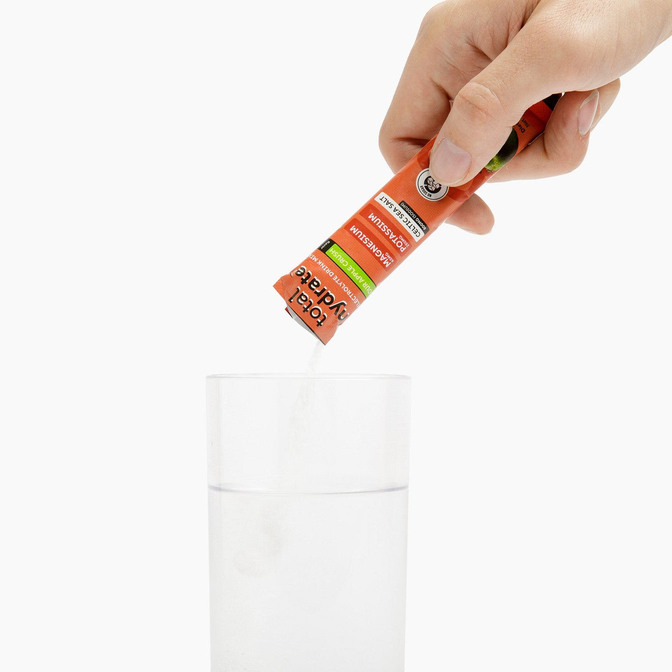 Iron Age Nutrition Total Hydrate Sour Apple Crush electrolyte powder in a container, showing the label and product packaging.