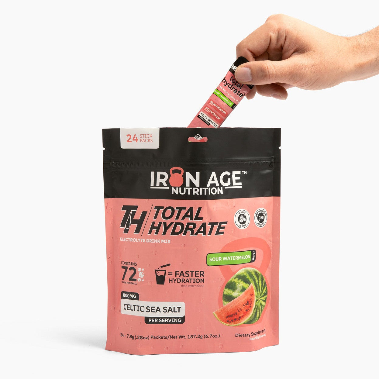 Iron Age Nutrition Total Hydrate Electrolyte Powder in Sour Watermelon flavor, showing the brightly colored powder inside a container.