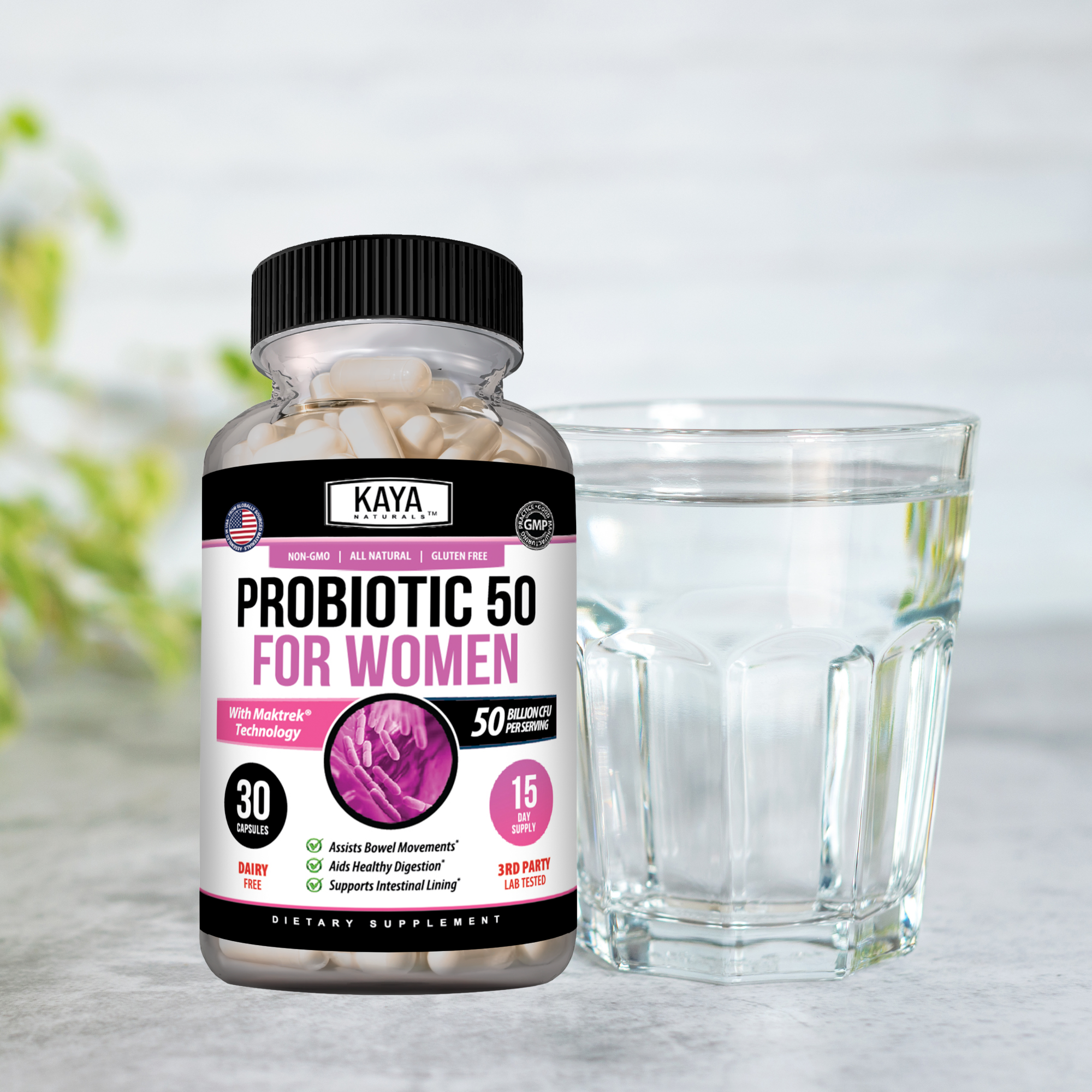 Woman holding bottle of Kaya Naturals Women's Probiotic with 50 Billion CFU, showcasing the supplement's packaging and label.