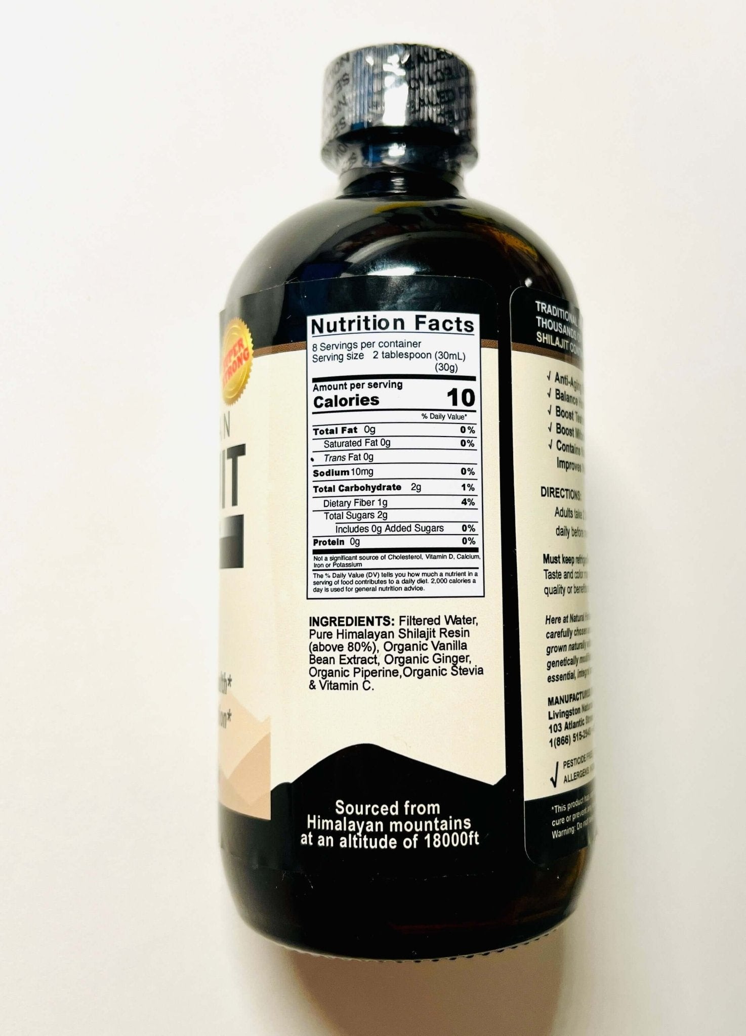 Liquid Himalayan Shilajit by VeggieVerve in a glass dropper bottle, showcasing the dark, resin-like substance inside.