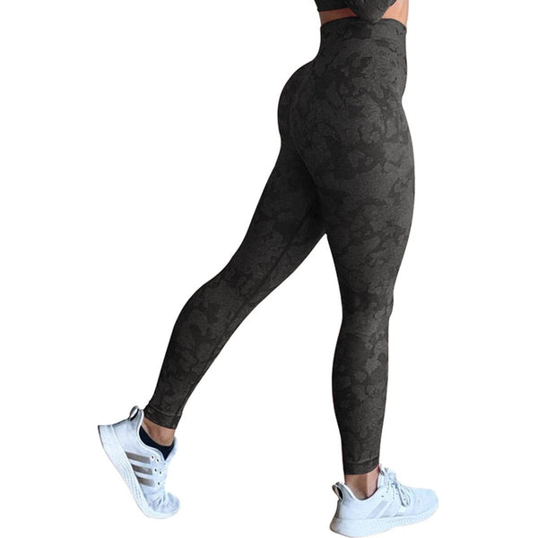 Mandotos women's butt leggings with push-up design, gym workout tights, fitness and yoga pants in black fabric.