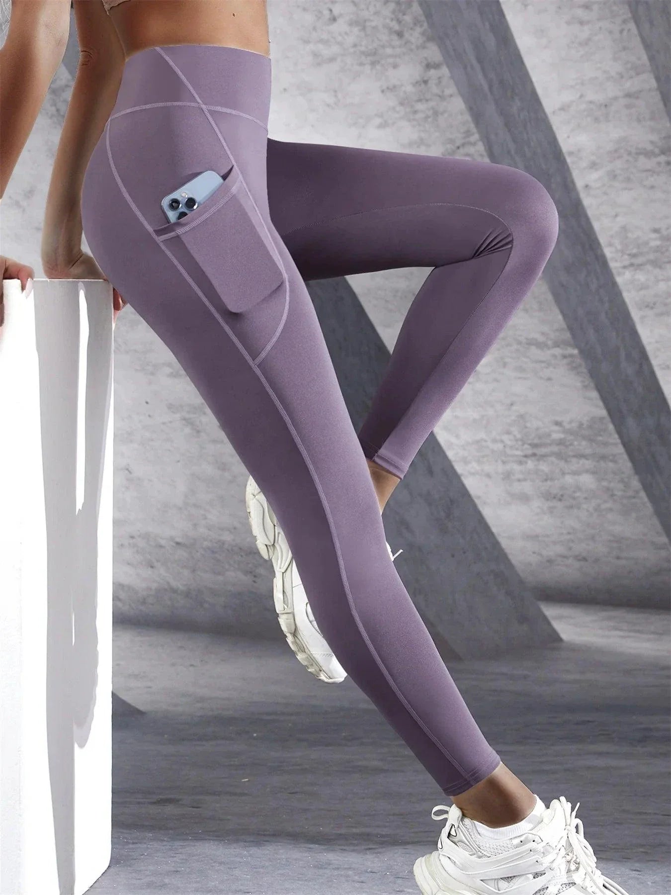 Mandotos high waist women's stretch leggings with pockets, ideal for yoga, running, and fitness, in solid color.