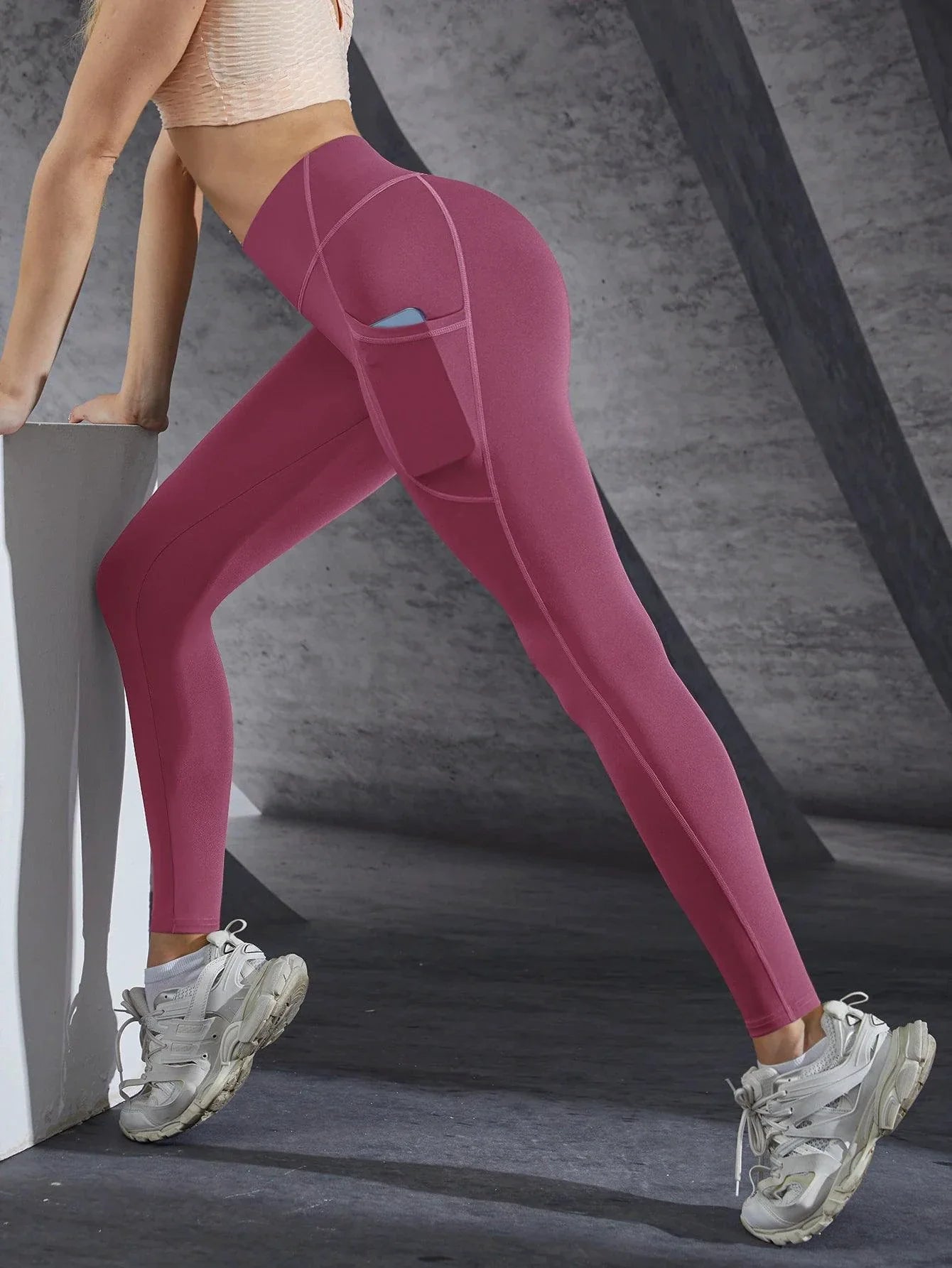 Mandotos high waist women's stretch yoga leggings with pockets, solid color, push-up fit, suitable for running and fitness activities.