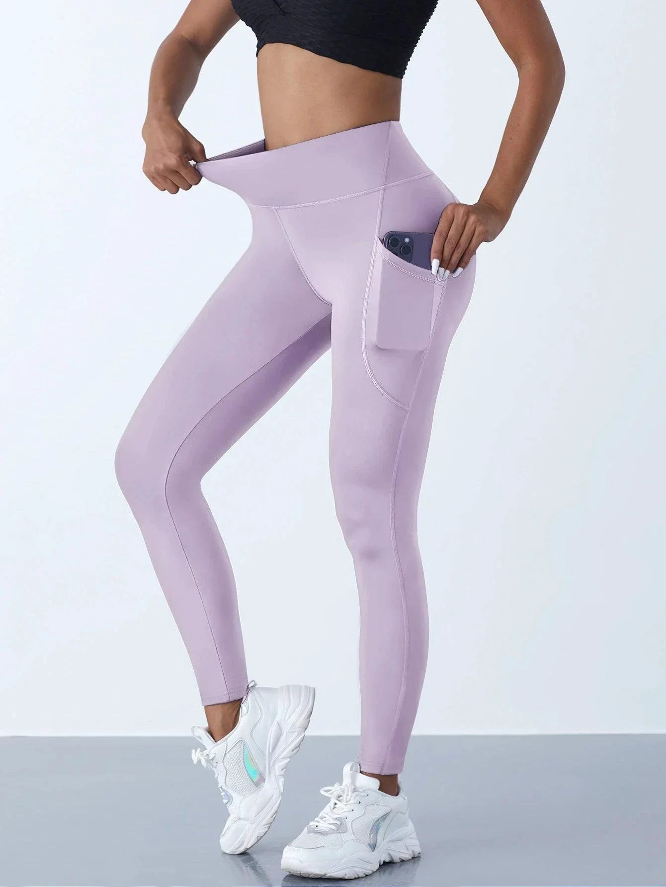 Mandotos high waist women's stretch yoga leggings with pockets, solid color, suitable for fitness, running, and sports activities.