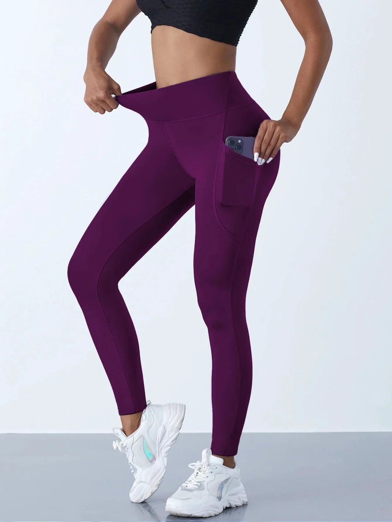 Mandotos high waist women's yoga leggings with pockets, stretch fabric, and a solid color design for fitness and running activities.