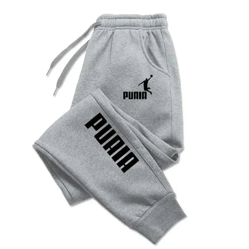 Mandotos PUAIA print men's jogger pants in solid color, featuring a sporty, loose fit design for autumn and winter streetwear.