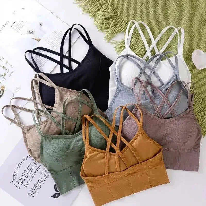 Mandotos women's sports bra with back cross straps, push-up design, breathable soft fabric, ideal for running and yoga.