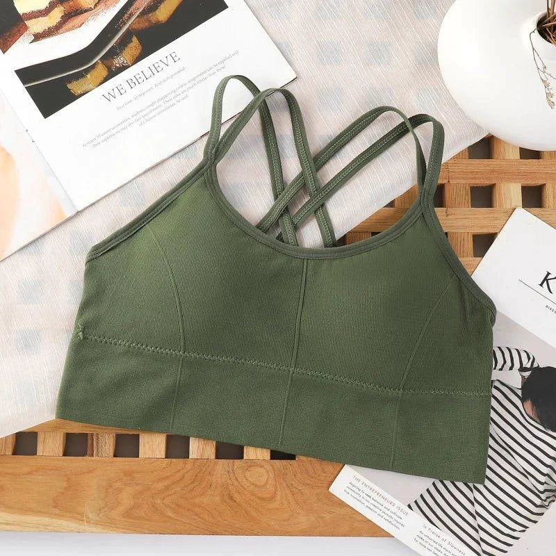 Mandotos sports bra for women with back cross straps, push-up design, breathable fabric, solid color, ideal for yoga and running.