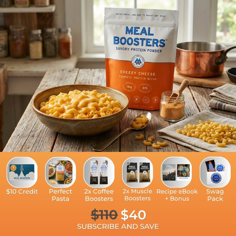 Meal Boosters Cheesy Cheese Collagen+ Protein Blend protein powder scoop with the product packaging in the background.