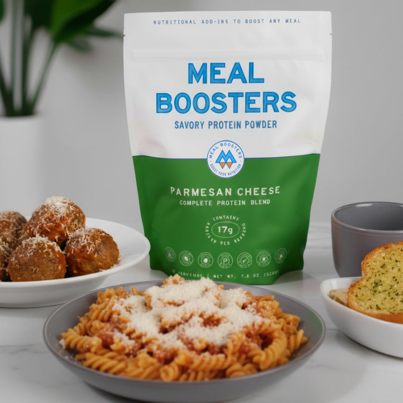 Meal Boosters Parmesan Cheese Collagen Protein Powder blend in a jar, showing the product label and scoop for serving.