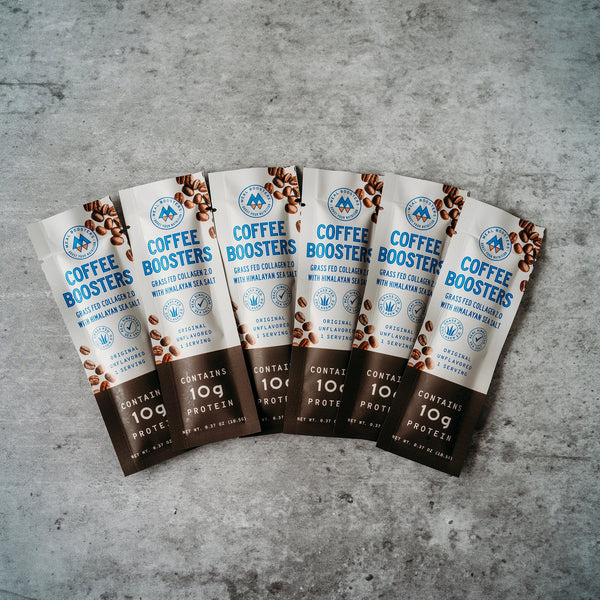 Unflavored collagen and electrolyte coffee booster packs from Meal Boosters, six single-serving sachets for energy and hydration.