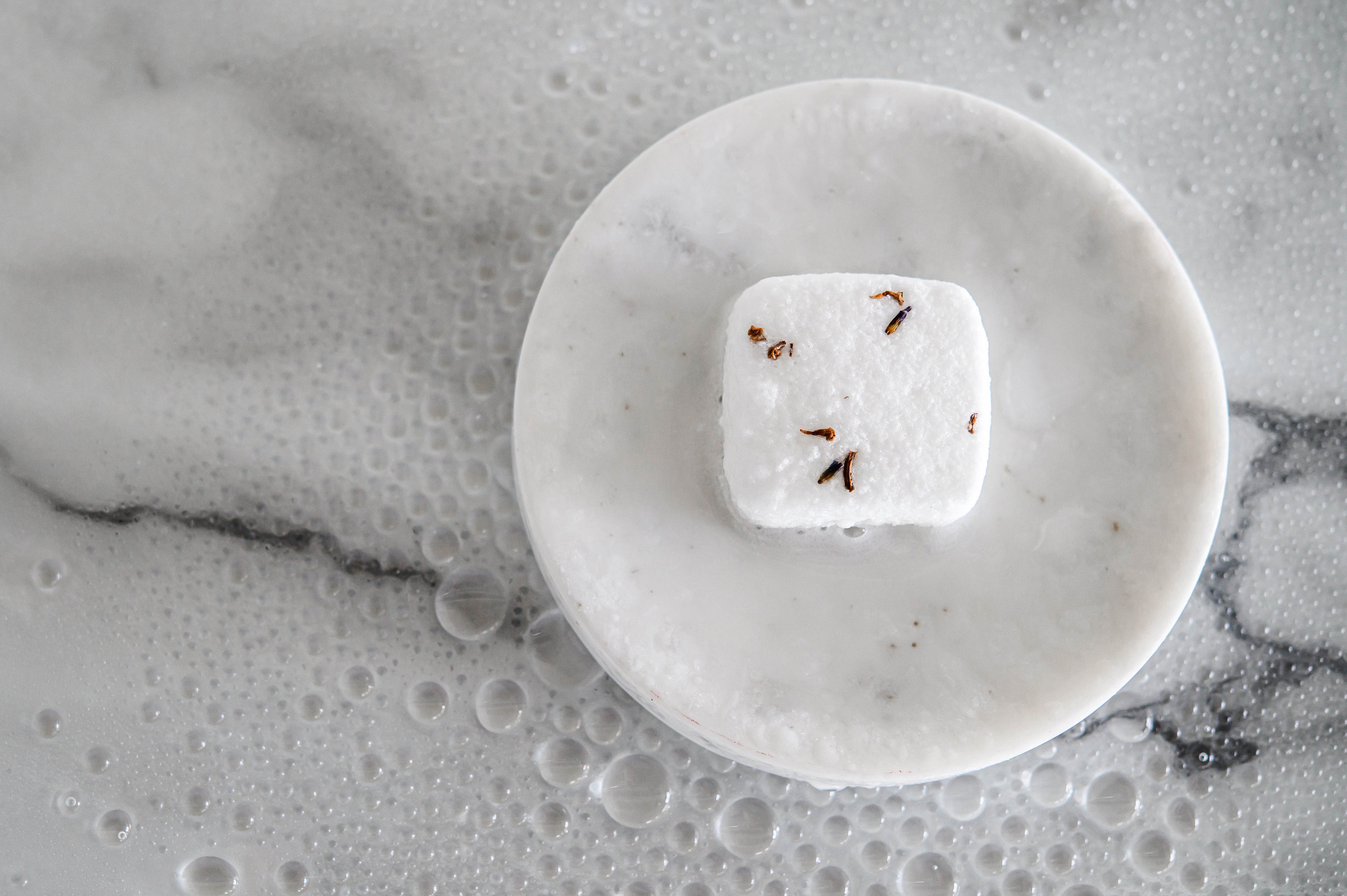 MoonFarma aromatherapy shower steamers with menthol for cold and flu relief, designed to decongest and refresh during showers.