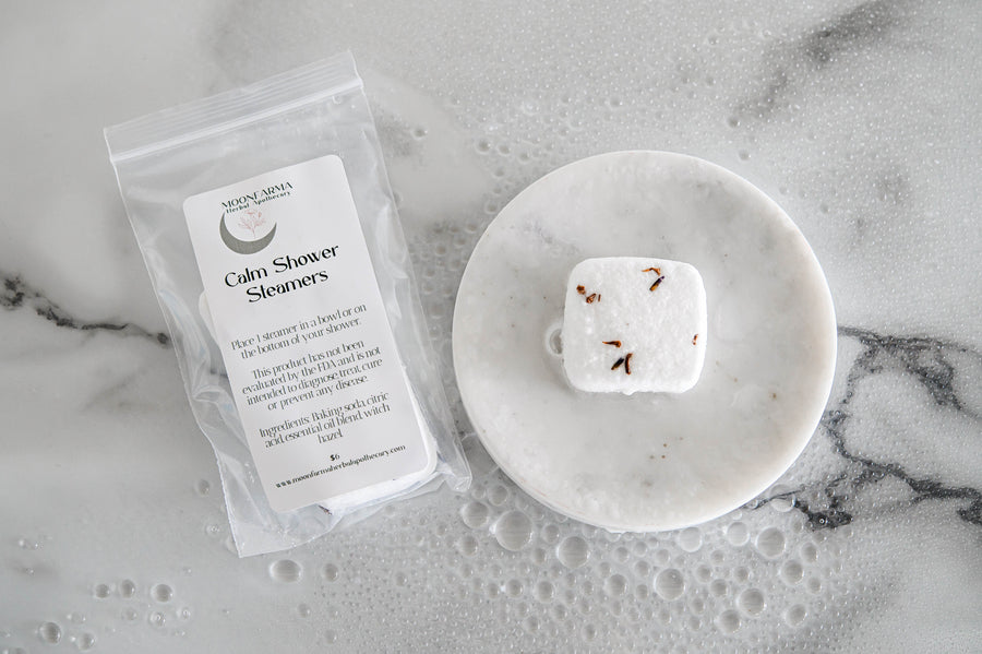 MoonFarma aromatherapy shower steamers for cold and flu relief with menthol, designed for soothing decongestion during showers.