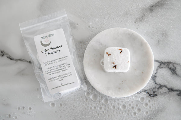 MoonFarma aromatherapy shower steamers for cold and flu relief with menthol, designed for soothing decongestion during showers.