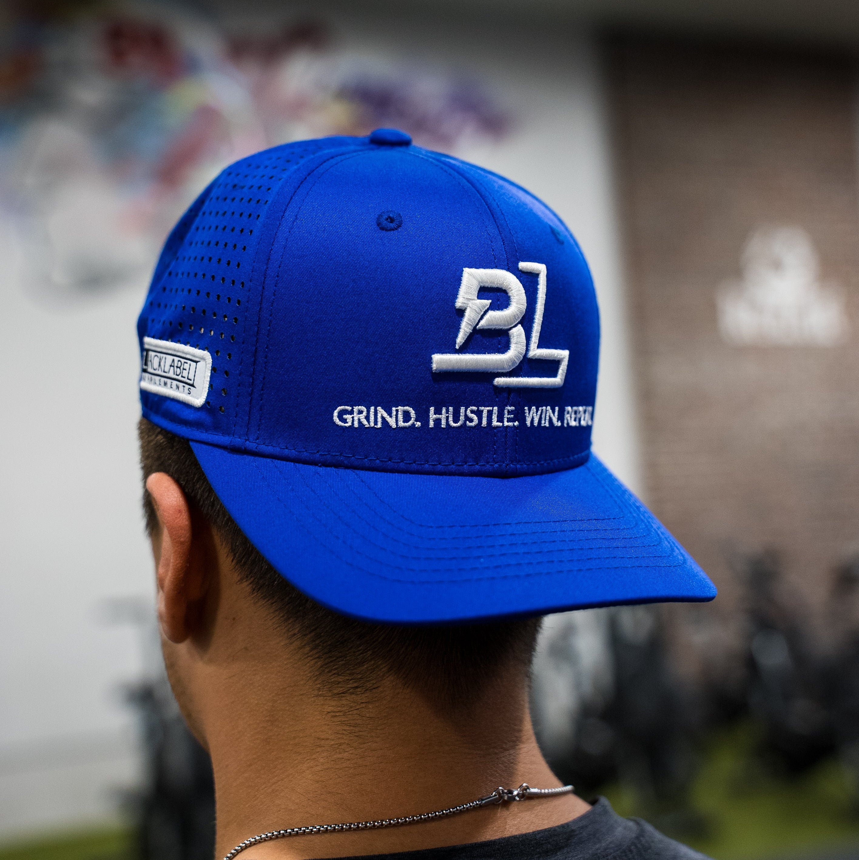 BLACKLABEL Supplements BL Lightning Hat featuring a stylish black cap with lightning logo embroidery.