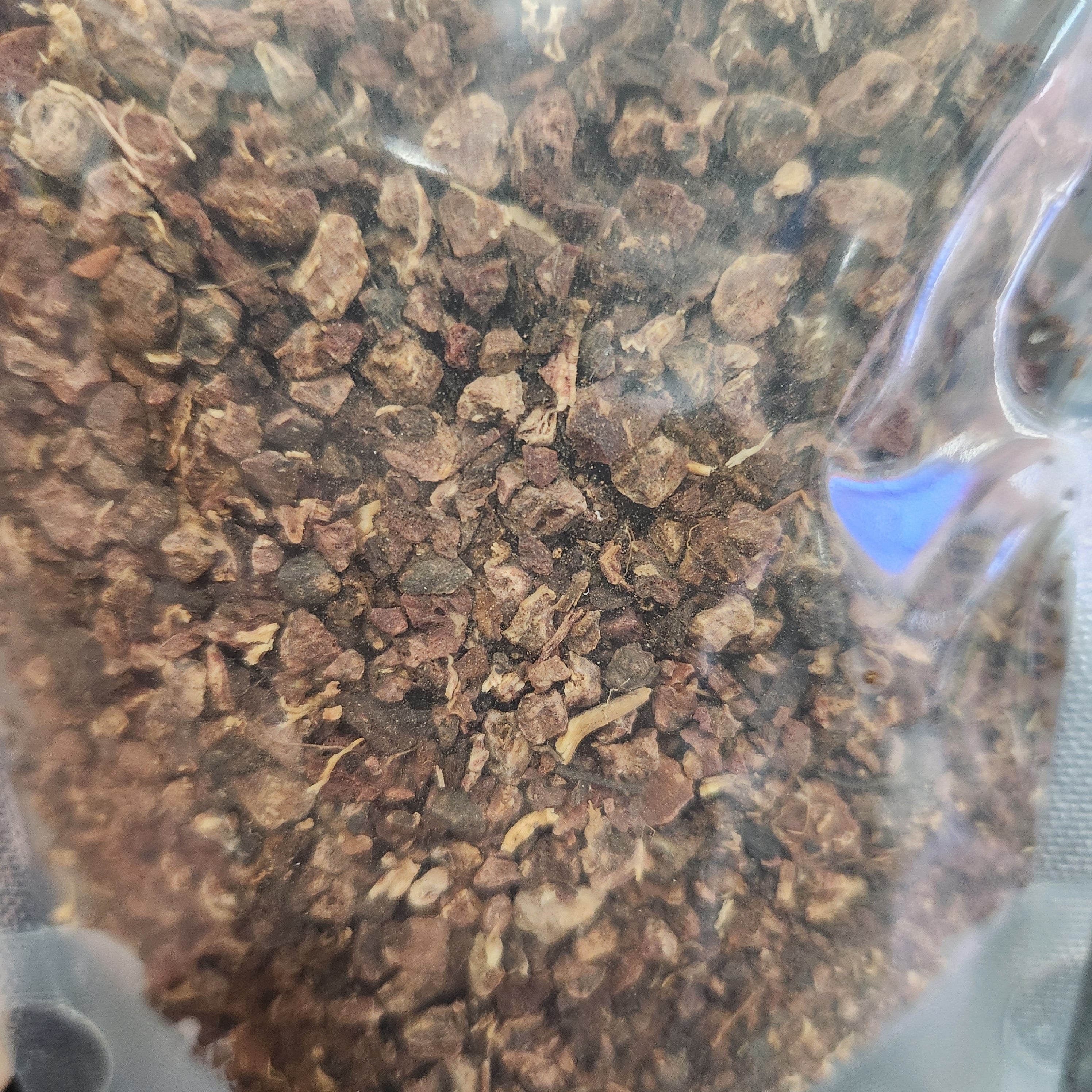 Loose herbs of Women's Botanical Herbal Blend by NYC Herbs®, premium loose leaf herbal formula with fresh botanical ingredients.