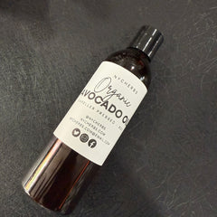 NYC Herbs® Avocado Oil in 4 oz bottle, rich in vitamins A, D, and E, shown in a clear glass bottle with a green label.