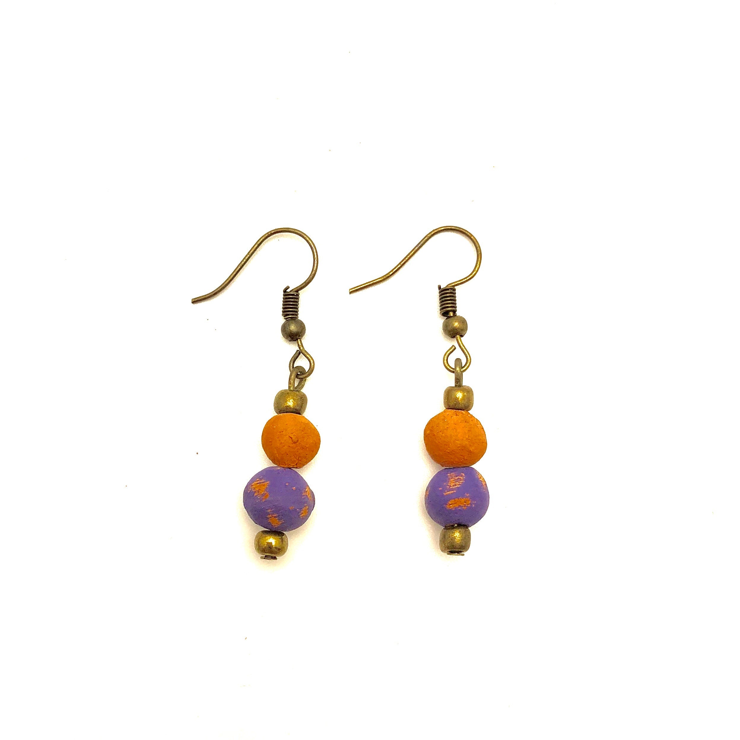 Antiqued cranberry-red aromatherapy earrings from Papillon Marketplace, featuring intricate metalwork and elegant dangle design.