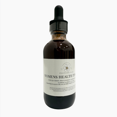 Bottle of Pioneer Pam Women's Health Tincture for PMS and menopause hormone support, with natural herbal ingredients.