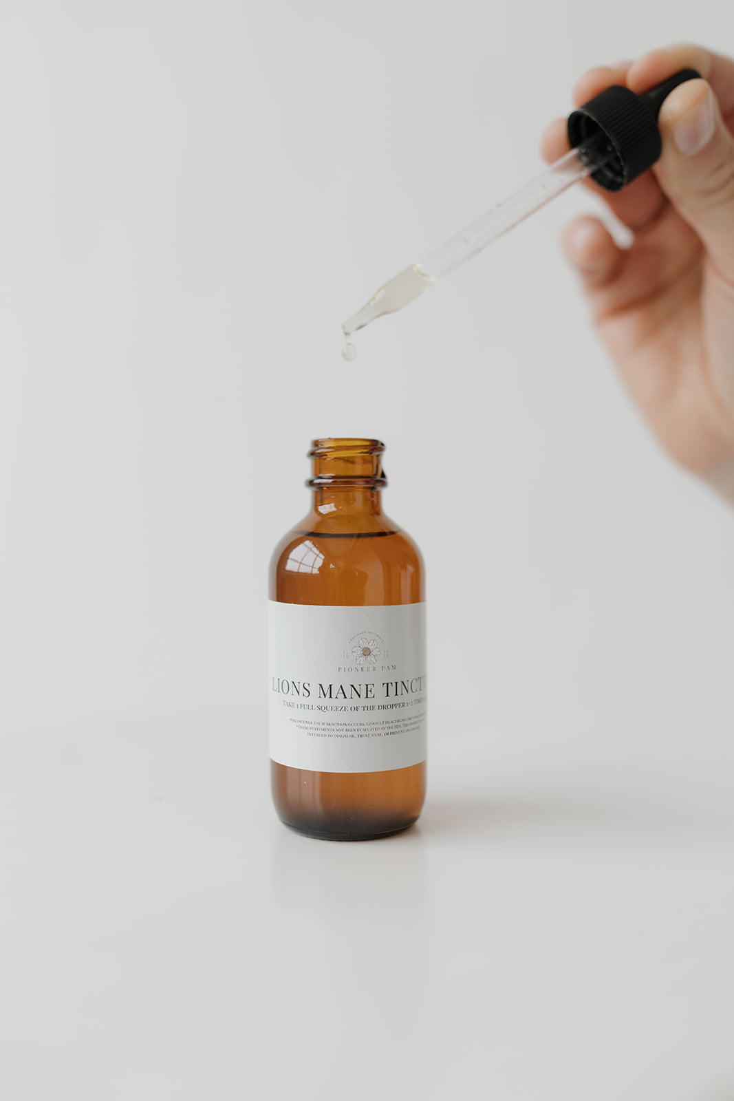 Pioneer Pam Brain Wellness Combo featuring Lion’s Mane tincture and magnesium spray for nervous system support.