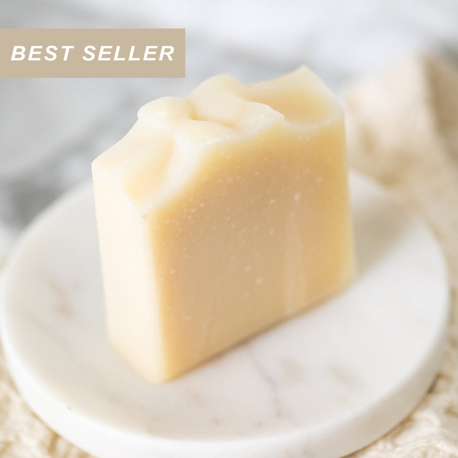 Handmade soap bar from Pretty Farm Girl with pure tallow and goat milk, fragrance-free and natural in appearance.