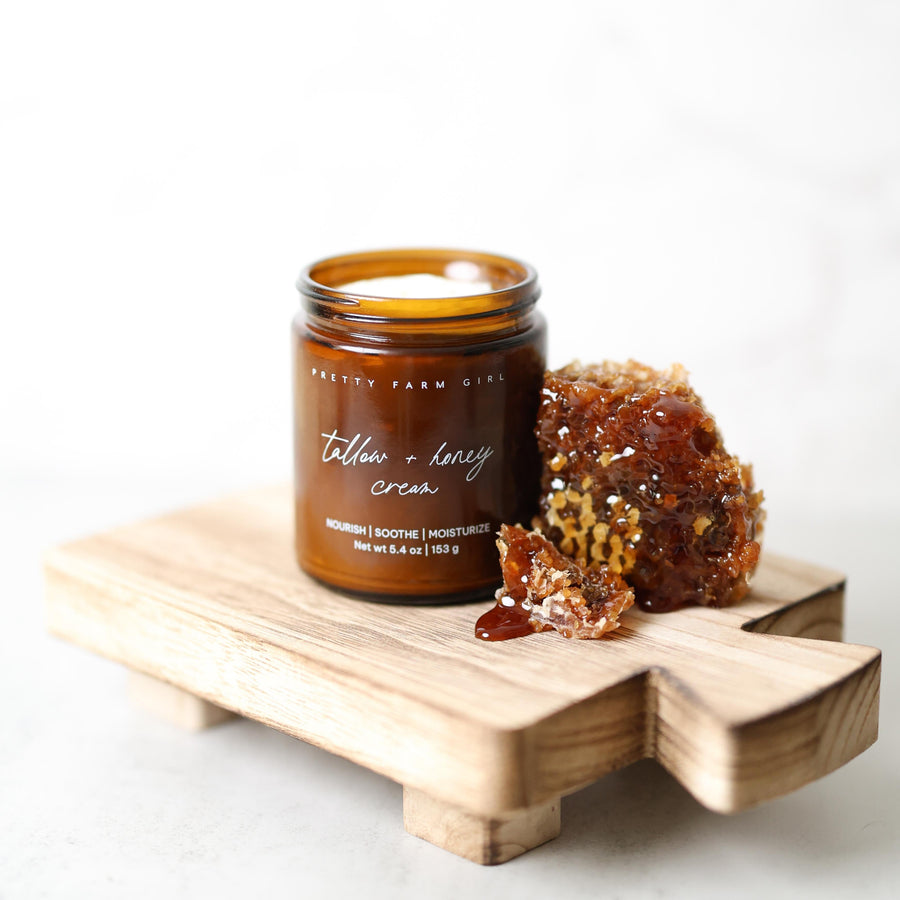 Cream by Pretty Farm Girl featuring fragrance-free tallow and honey, shown in a 4oz jar with a natural, smooth texture.