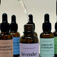 Relax Away Essentials lavender aromatherapy diffuser oil in 1 oz bottle, featuring lavender, peppermint, and citrus scent blends.