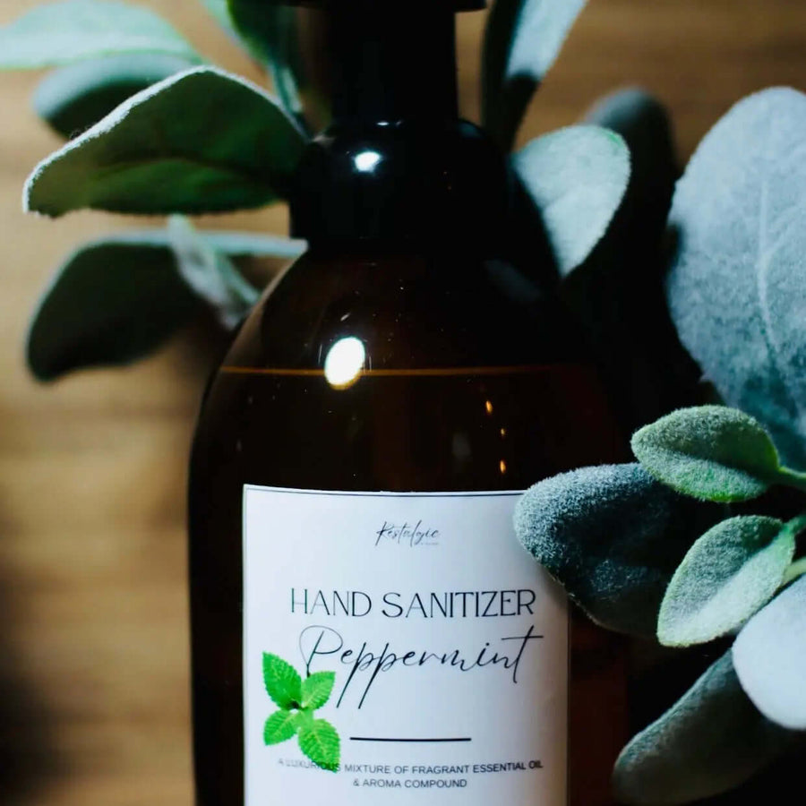Restalgic Atelier organic foaming hand sanitizer in 16oz bottle with orange, peppermint, and bergamot scent.