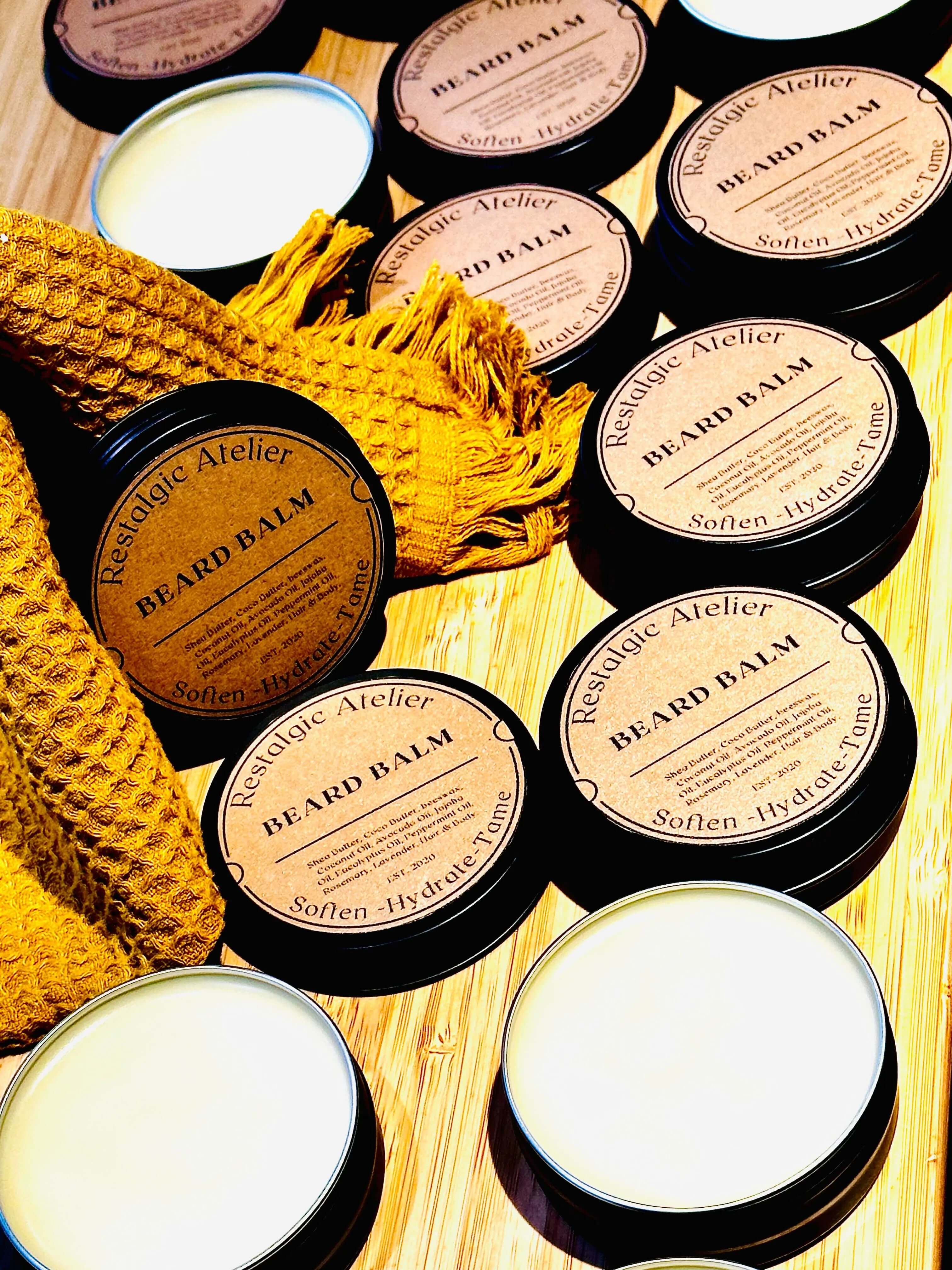 Restalgic Atelier Luxury Beard Balm in a 2oz jar, featuring a smooth, nourishing formula for soft, well-groomed beards.