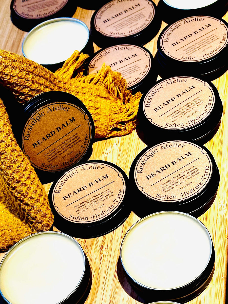 Restalgic Atelier Luxury Beard Balm in a 2oz jar, featuring a smooth, nourishing formula for soft, well-groomed beards.