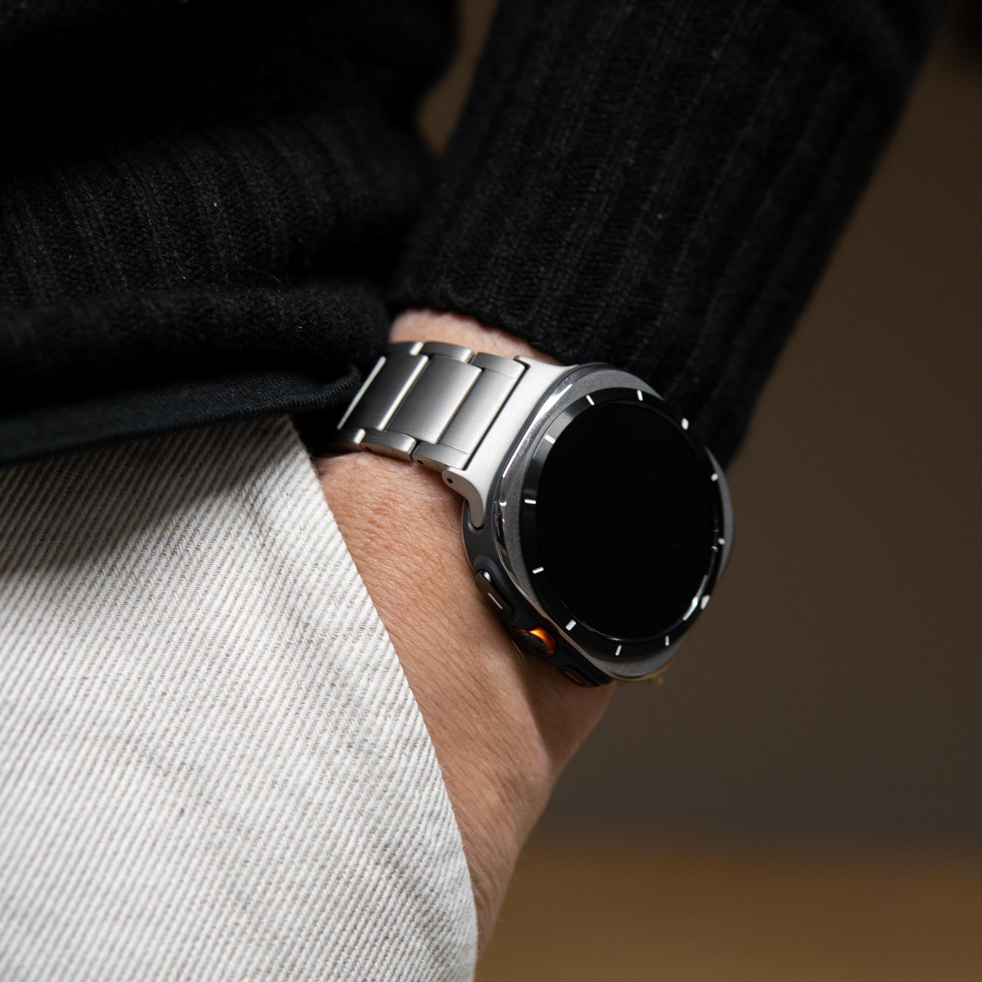 Robust titanium band T01 for Samsung Galaxy Watch Ultra, showing the sleek, natural titanium watch strap on a white background.