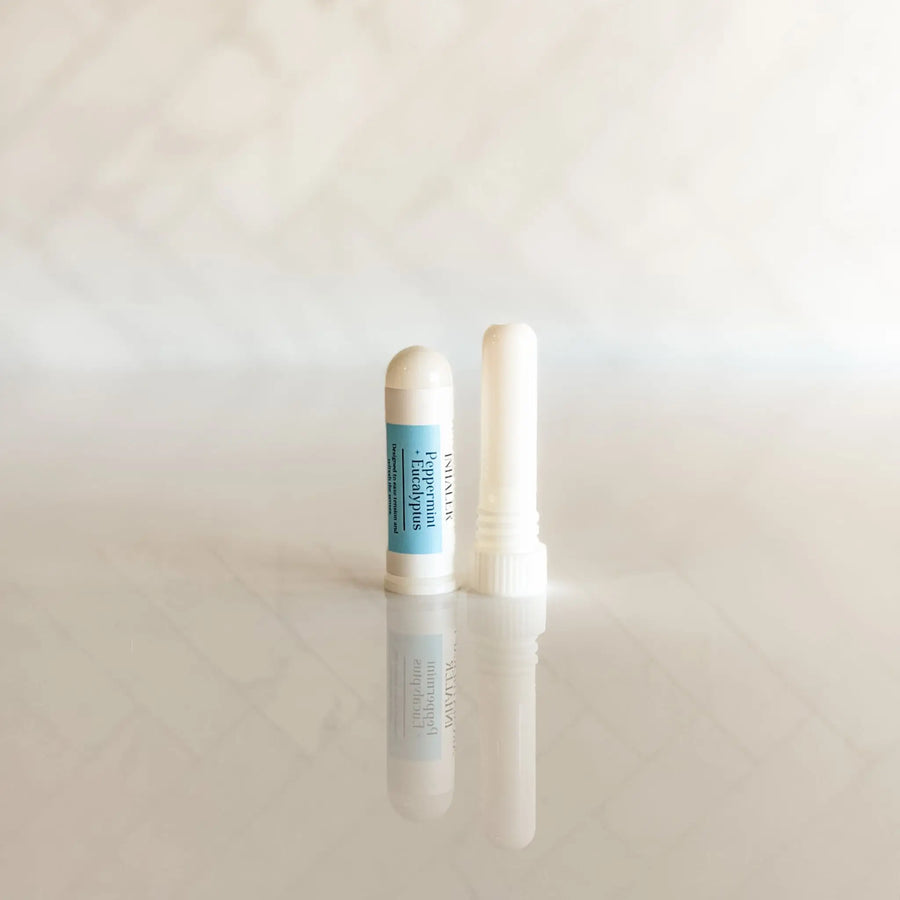 Peppermint and eucalyptus aroma nasal inhaler stick by Simply Stated Creations, used for aromatherapy and breath refreshment.