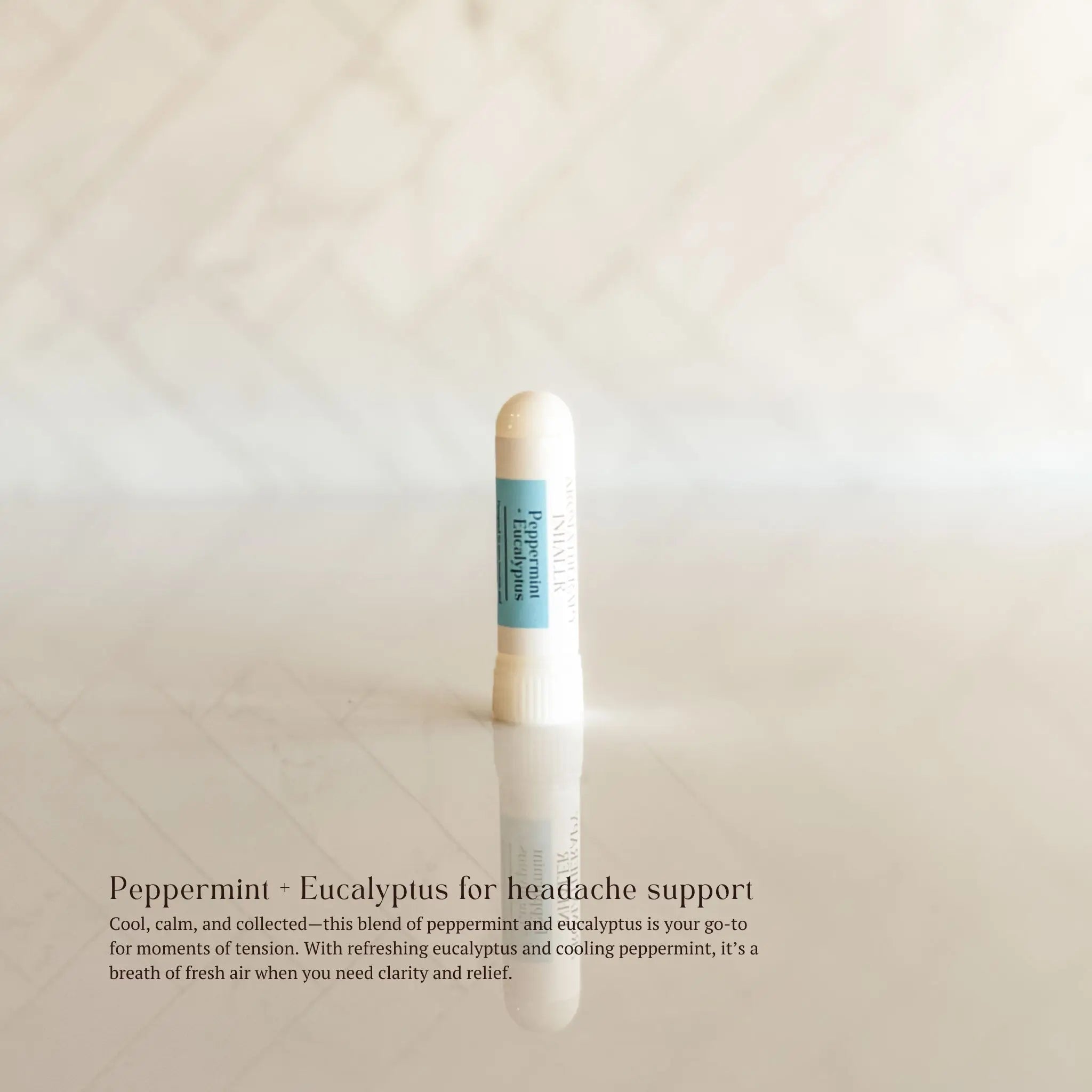 Peppermint and eucalyptus aroma nasal inhaler stick by Simply Stated Creations, used for aromatherapy and breath freshening.