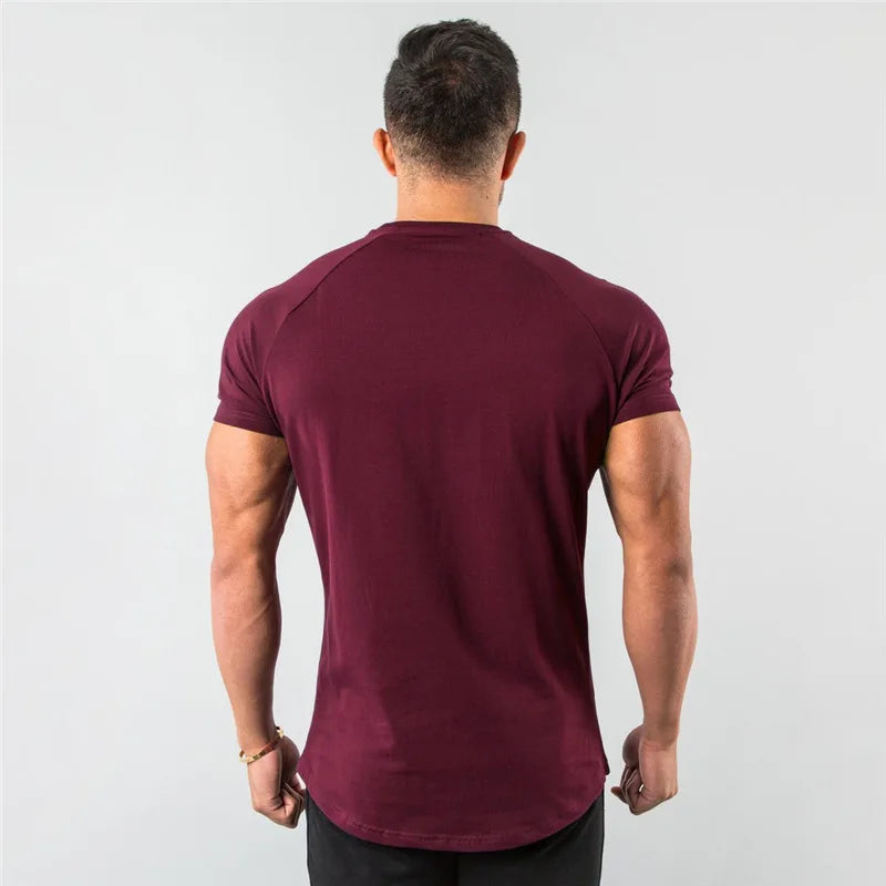 Blue men's cotton plain top from THRIXINE, suitable for fitness and casual wear, styled as a comfortable T-shirt.