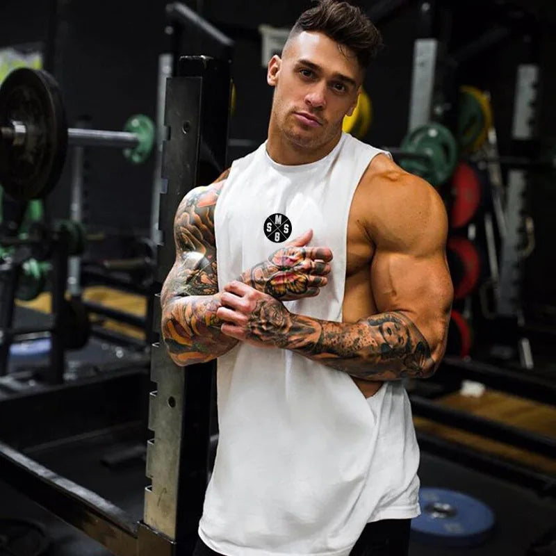 Black Thrixine muscle guys low cut fitness tank top for men, showcasing a sleeveless athletic tank with a fitted design.
