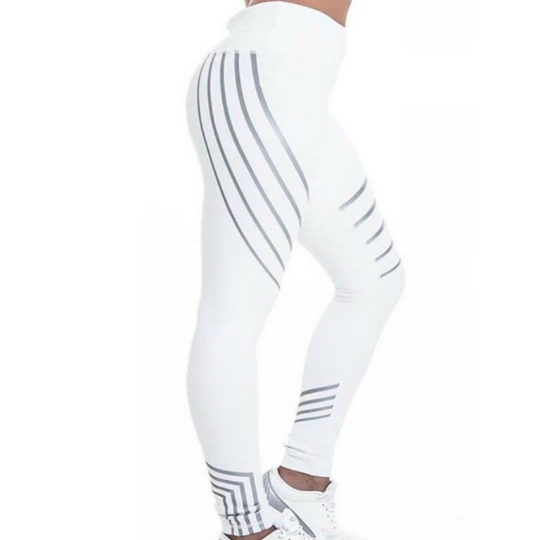 Black and white striped women's skinny leggings with a high waist, suitable for gym, running, and workout activities.