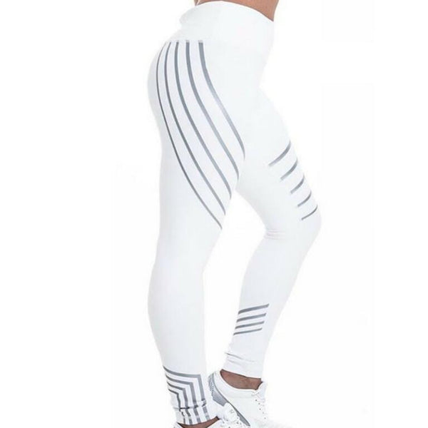 Black and white striped women's skinny leggings with a high waist, suitable for gym, running, and workout activities.