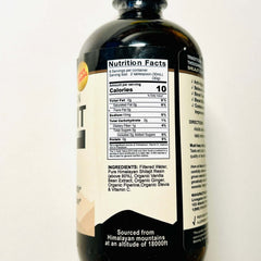 Liquid Himalayan Shilajit herbal supplement by VeggieVerve in a 16 fl oz bottle, showcasing the dark resin-like extract inside.