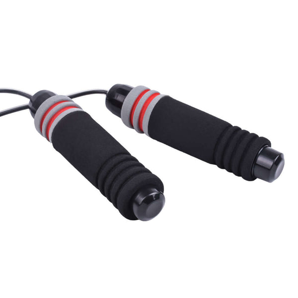 Red and black adjustable Vellmara jumping rope for fitness, featuring ergonomic handles and durable design for cardio workouts.