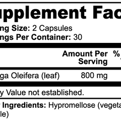 Green Moringa Pure supplement bottle from Vitalidad Natural with label and natural plant imagery.