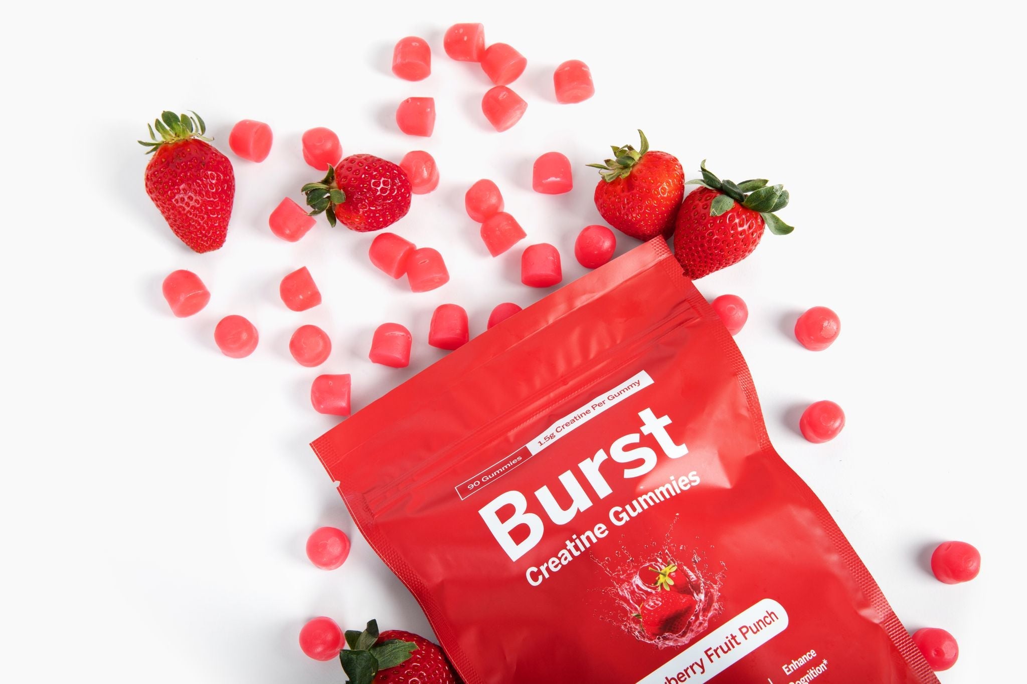 Burst Nutrition Creatine Gummies with orange and white gummies on a white background, showing the supplement's texture and shape.