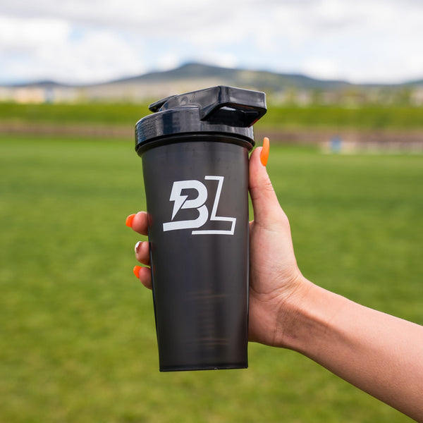 BLACKLABEL Supplements 28 oz shaker bottle for protein shakes and drinks, with a secure lid and ergonomic design.