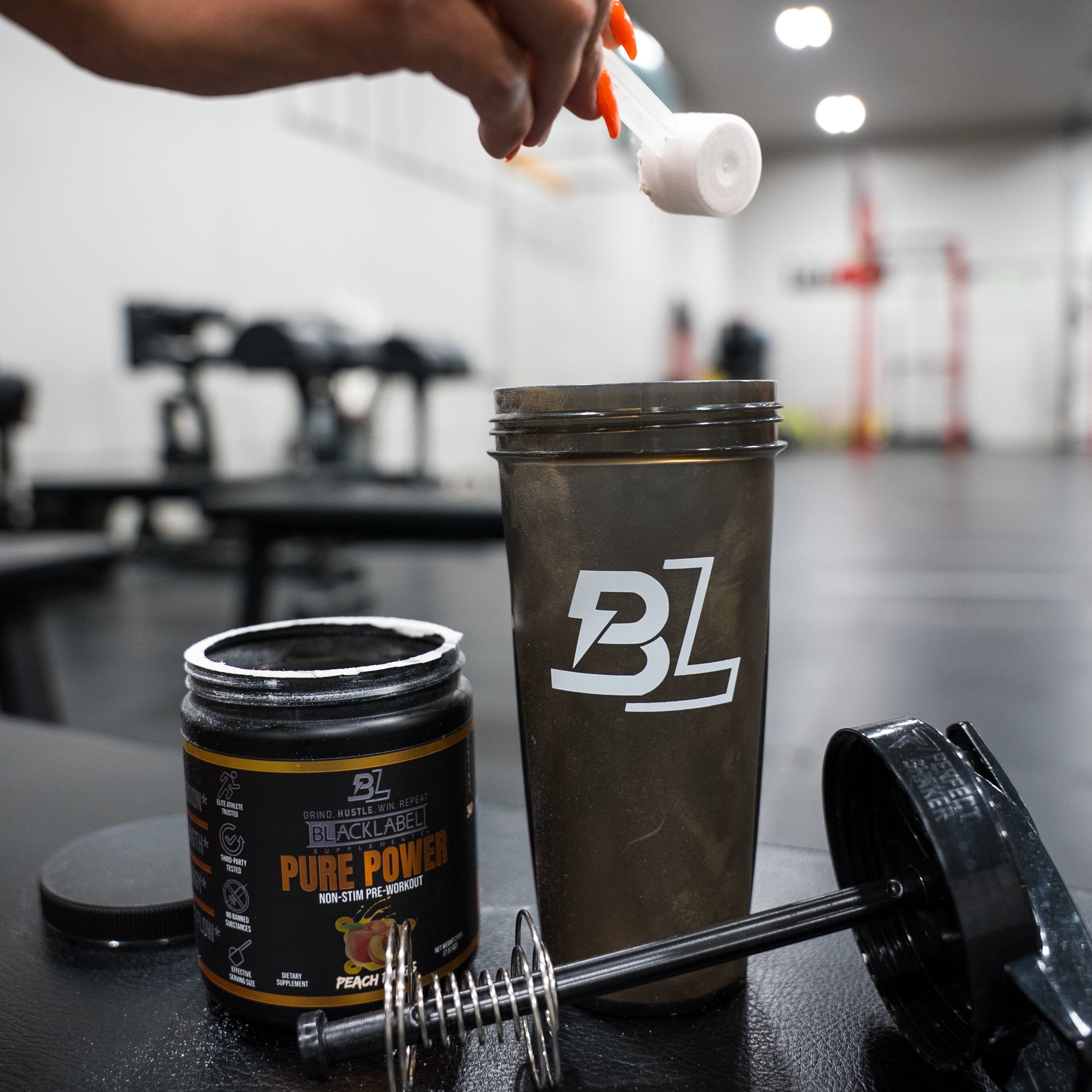 BlackLabel Supplements PURE POWER vitamins and supplements bottle with colorful label, displayed on a clean white background.