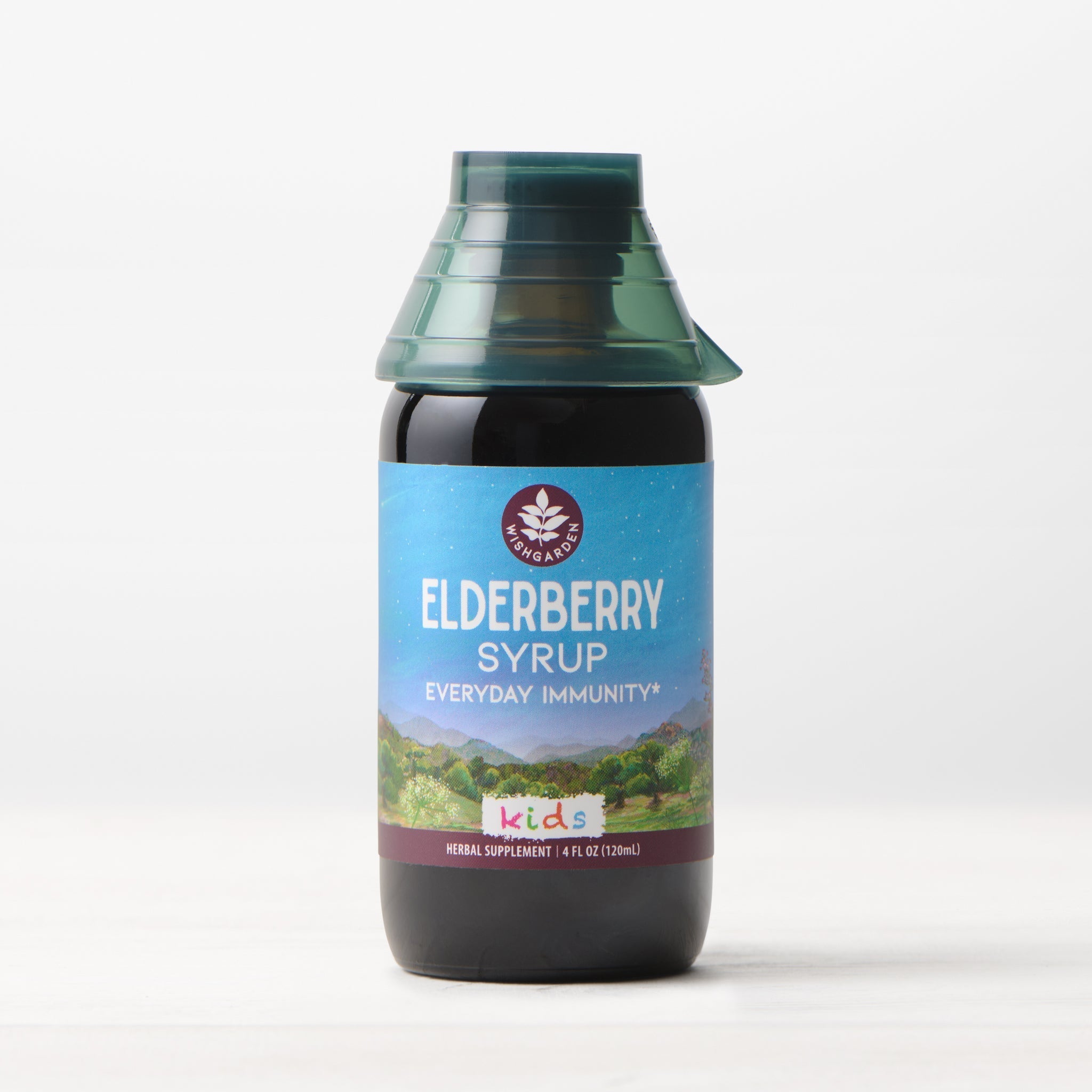 Kids elderberry syrup by WishGarden Herbs in a 4oz bottle, featuring a premium herbal botanical blend for children.