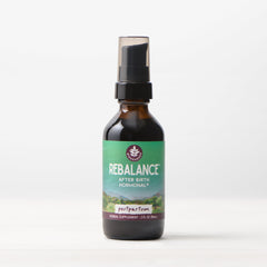 WishGarden Herbs ReBalance Postpartum hormonal supplement in 2oz pump bottle, designed for postpartum hormonal support.