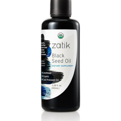 Dark glass bottle of Zatik Naturals Black Seed Oil for health care, with a dropper cap and label showing product details.